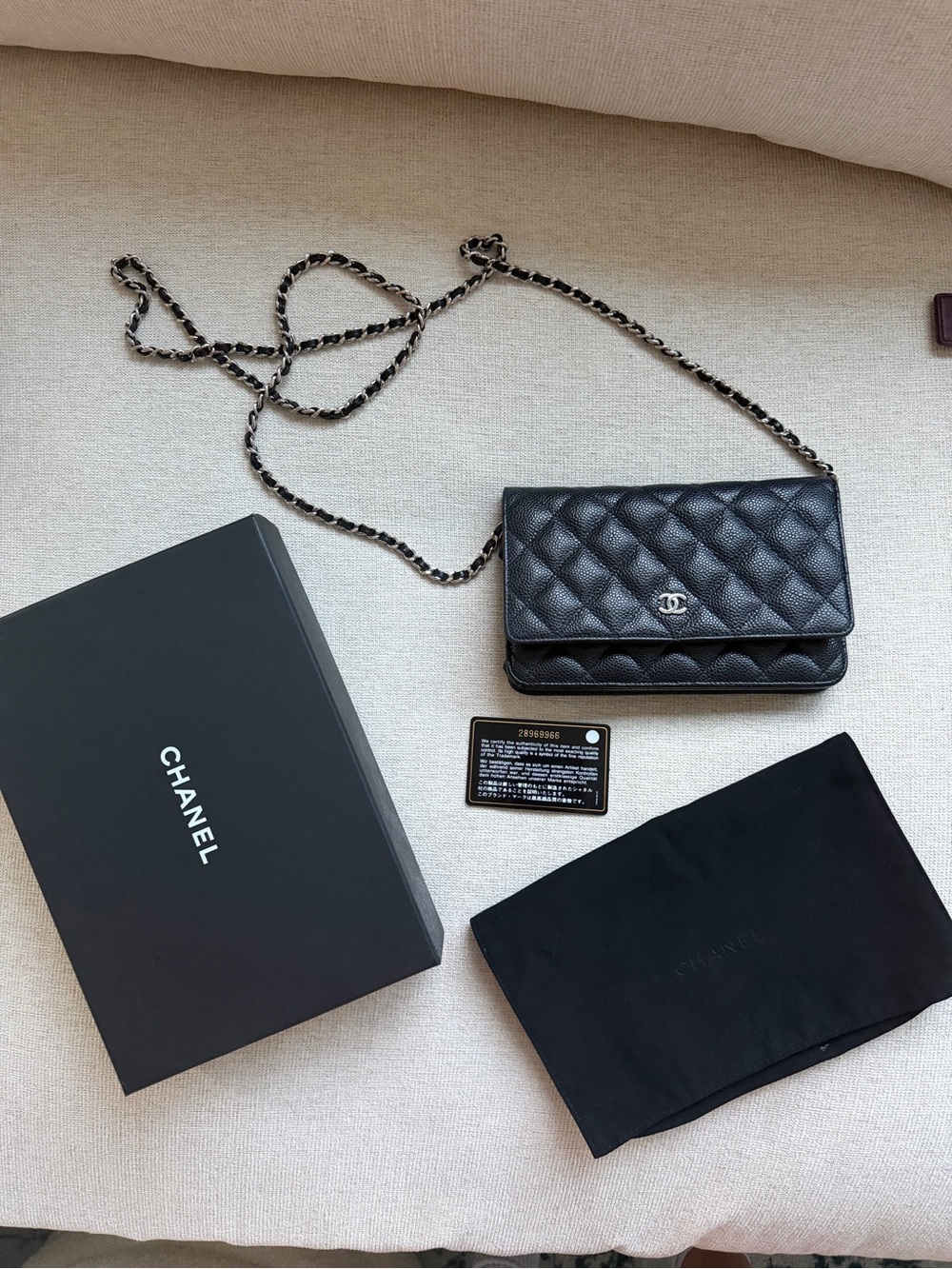 CHANEL Black Quilted Caviar Leather WOC